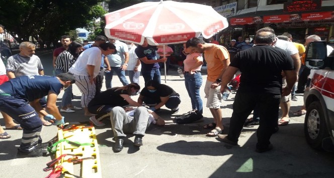 Yaralı güneşten plaj şemsiyesiyle korundu