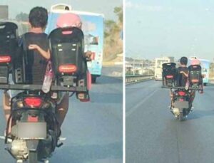 Antalya’da trafikte akıl almaz görüntü: motosiklet sürücüsü baba iki çocuğunu böyle taşıdı