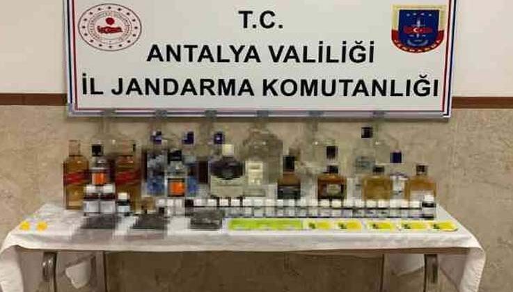 Evinde sahte içki üretirken yakalandı
