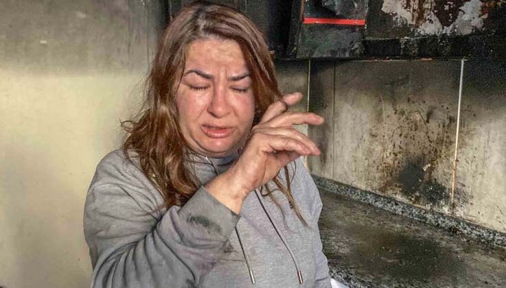Evinin yandığını gören kadın kurye sinir krizi geçirdi