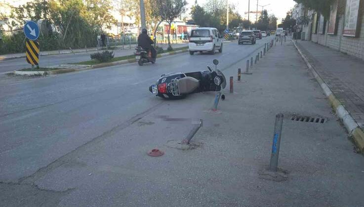 Otomobille çarpışan motosiklet sürücüsü yaralandı