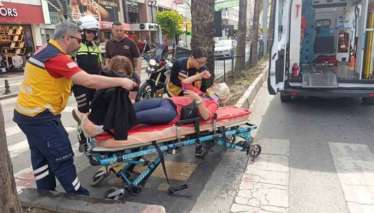 Yaya geçidinde frene basıp düşen motosiklet sürücüsü kask sayesinde hayatta kaldı